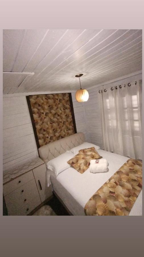 Pousada E Hostel Girassol Имбитуба Экстерьер фото
